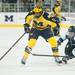Wolverines center Cristoval Nieves sakes the puck down the ice against Spartans center Michael Ferrantino during the first period of their game at Yost Ice Arena Friday Feb. 1st.
Courtney Sacco I AnnArbor.com   